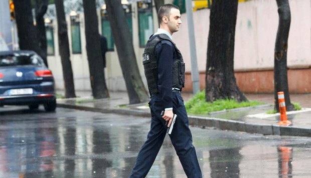 A police officer patrols a street following the attack in Istanbul