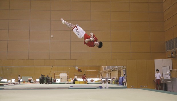 In this February 26, 2016, picture, Olympic gold medal gymnast Kohei Uchimura takes part in a training session at the National Training Center in Tokyo, Japan. (Reuters)