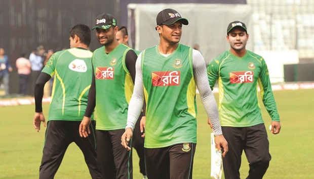 Bangladeshu2019s Tamim Iqbal (left) and Shakib Al Hasan (centre) during a practice session in Mirpur yesterday.