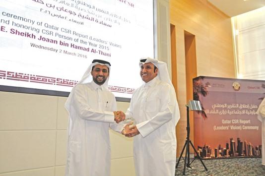 Eisa al-Hammadi being congratulated at the ceremony.