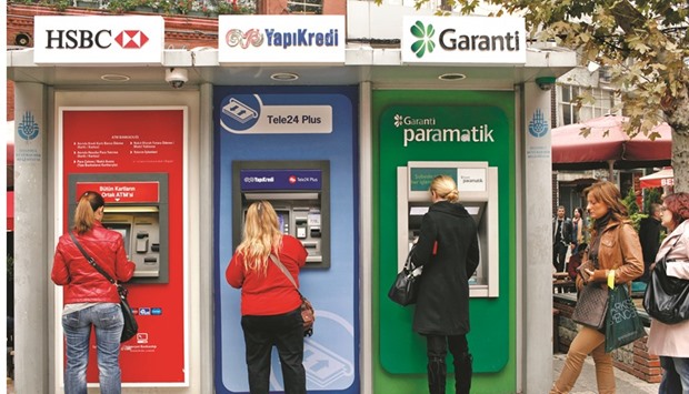 Customers use HSBC Holdings, Yap ve Kredi Bankasi and Turkiye Garanti Bankasi ATMs in Istanbul, Turkey (file). Non-performing loans at the nationu2019s lenders climbed to 3.18% of total credit in January, the sixth straight monthly increase and the highest proportion in almost five years, according to data last week from the Ankara-based Banking Regulation and Supervision Agency.