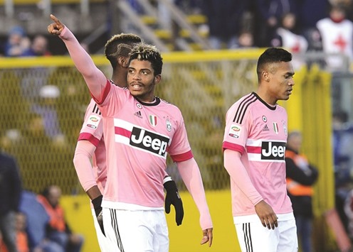 Juventus' Mario Lemina (centre) celebrates with teammates after scoring the second goal against Atalanta yesterday. (Reuters)