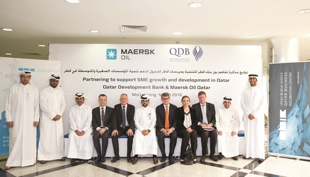 Al-Khalifa and Thomasen with senior QDB and Danish officials after the agreement signing.