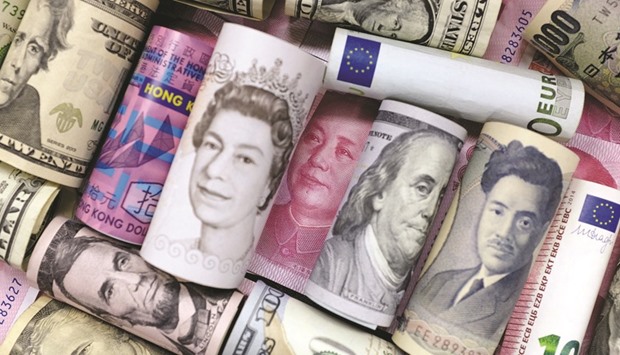 Euro, Hong Kong dollar, US dollar, yen, pound and 100 yuan banknotes are seen in this illustration. Chinau2019s foreign-exchange reserves dropped to $3.20tn at the end of February, the Peopleu2019s Bank of China said on its website yesterday.