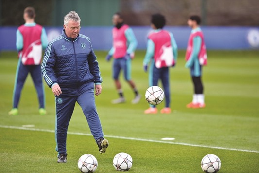 Chelseau2019s Dutch manager Guus Hiddink leads a training session at Chelseau2019s Cobham training facility in Stoke Du2019Abernon, southwest of London, ahead of their Champions League match against PSG. (AFP)