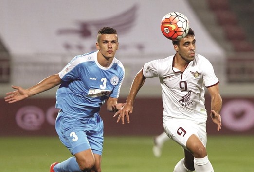 El Jaishu2019s Moroccan striker Abderrazak Hamdallah (R) in action during a Qatar Stars League match.