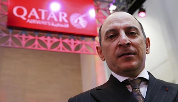 Qatar Airways Chief Executive Akbar al-Baker tours the company's stand at the International Tourism Trade Fair (ITB) in Berlin on Wednesday.
