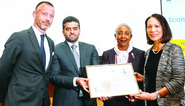 Al-Meer (second left) receives the 'Mapping Level' of the ACI Airport Carbon Accreditation programme on behalf of the HIA in London.