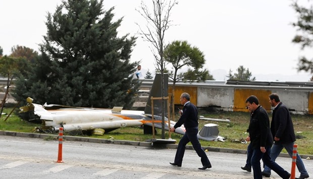 Wreckage of a helicopter is seen after it crashed in Istanbul, Turkey