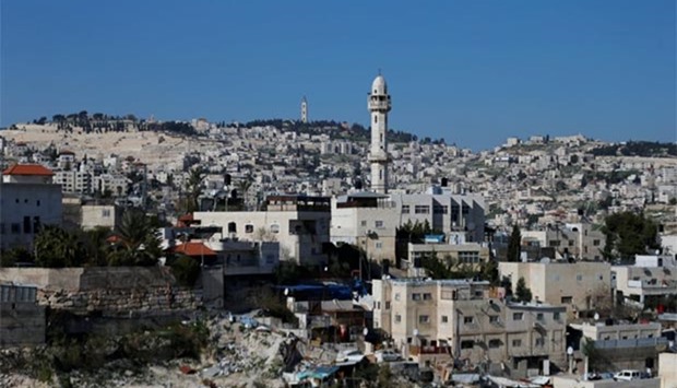 The minaret of a mosque is seen near the East Jerusalem neighbourhood of Silwan.
