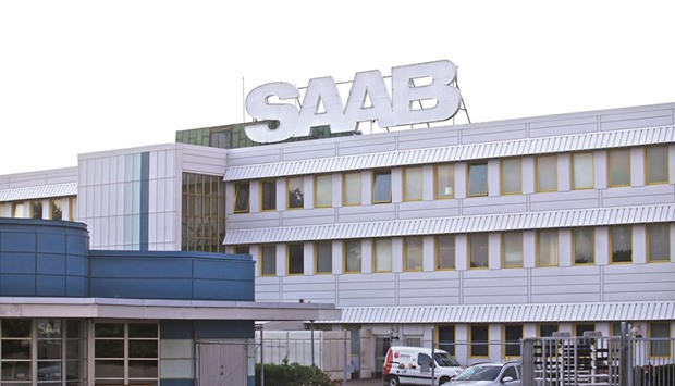 The logo of Saab is seen above the companyu2019s headquarters in Trolhattan, Sweden. Saab began construction of the A26 submarine, a Kockums design that had been put on hold under the ownership of Germanyu2019s ThyssenKrupp, in 2015, and has so far won orders for two vessels from the Swedish Defence Materiel Administration valued at 7.6bn kronor.