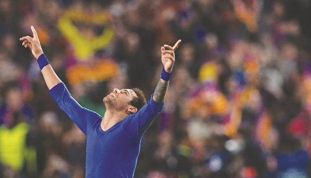 Barcelonau2019s Brazilian forward Neymar celebrates their 6-1 victory at the end of the UEFA Champions League round of 16 second leg match against Paris Saint-Germain.