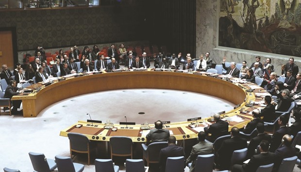 Participants in a United Nations Security Council meeting following a vote on a resolution to ban the supply of helicopters to the Syrian government over accusations of toxic gas attacks at the UN headquarters in New York City yesterday.