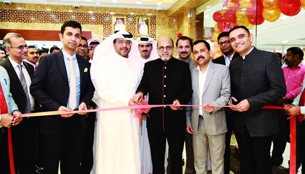 Doha Bank CEO Dr R Seetharaman inaugurates the new showroom in the presence of Kalyan Jewellers overseas head N R Venkatraman and other dignitaries.