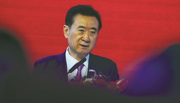 Wang Jianlin, chairman of the Wanda Group, speaks during a media event in Beijing. Eldridge Industries on Friday terminated a $1bn deal to sell its Golden Globe Awards producer Dick Clark Productions to the Chinese firm.