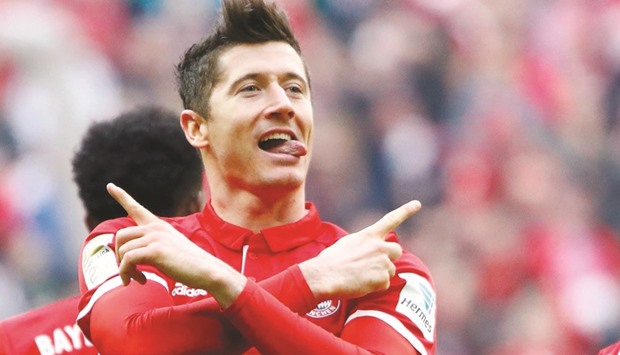 Bayern Munichu2019s Robert Lewandowski celebrates after scoring against Frankfurt in the Bundesliga yesterday.