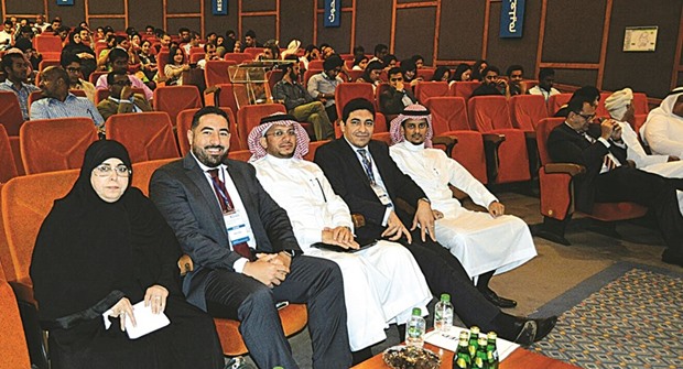 Dr Moza al-Hail along with some speakers from the symposium.