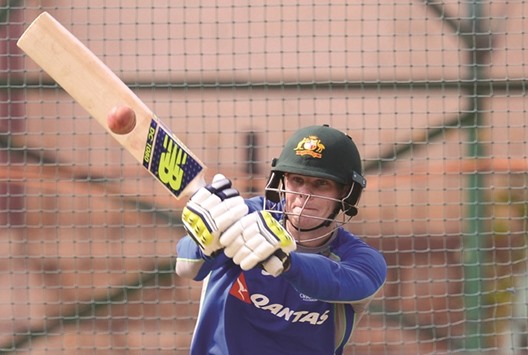 Australiau2019s captain Steve Smith bats in the nets during a practice session at The M. Chinnaswamy Stadium in Bangalore yesterday.