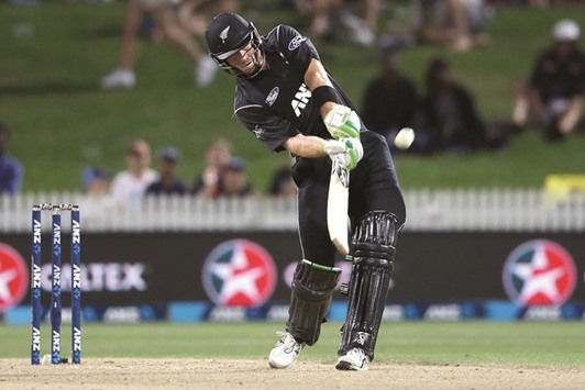 Martin Guptill of New Zealand belts the South African bowling at Seddon Park in Hamilton yesterday.