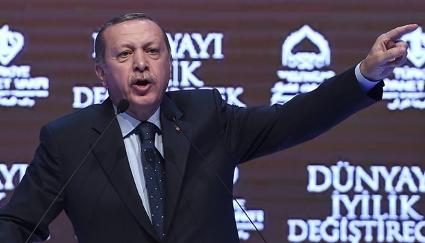Turkish President Recep Tayyip Erdogan gestures as he speaks in Istanbul.