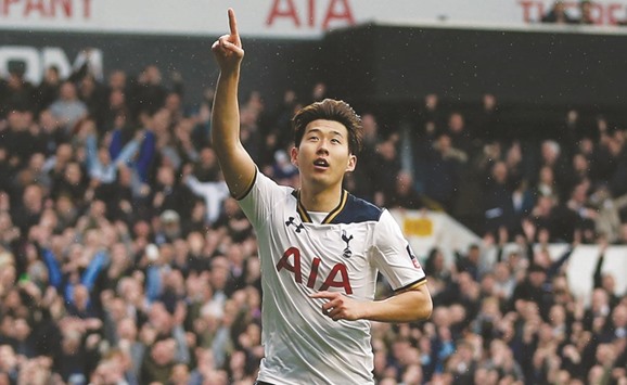 Tottenhamu2019s Son Heung-min celebrates scoring their third goal against Milwall yesterday.