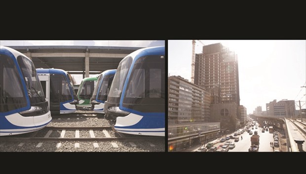 These file photos taken on April 3, 2015 show the view due west from the Meskel Square station of the Addis Ababa light rail, and Chinese-constructed light rail trains (left) at the Kality Depot in Addis Ababa.