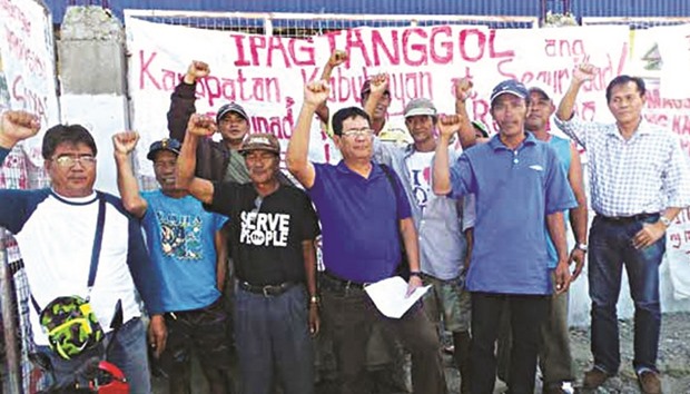 Joseph Canlas (centre) of the militant group, Kilusang Magbubukid ng Pilipinas will lead the protest rally today at the National Irrigation Administration central office in Quezon City.