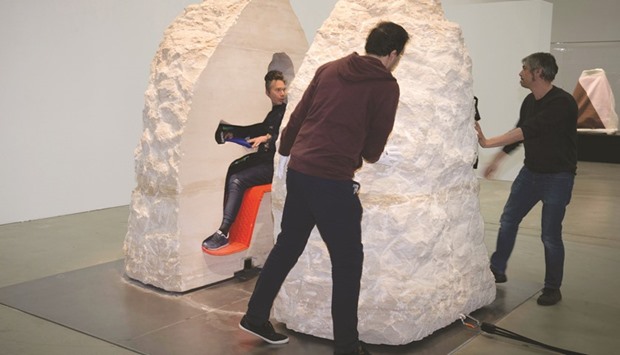 French artist Abraham Poincheval being released from a rock after being entombed inside for a week at the Palais de Tokyo in Paris yesterday.