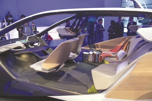 The interior of the BMWi Inside Future concept vehicle is seen during a press event at the 2017 Consumer Electronics Show in Las Vegas, Nevada, US, on January 4. Bayerische Motoren Werke will dispatch a fleet of autonomous vehicles to US and European cities in this yearu2019s second half, the next step in its partnership with Mobileye and Intel Corp to introduce fully self-driving vehicles by 2021. With Mobileye, Intel gains the ability to offer automakers a larger package of all of the components they will need as vehicles become autonomous.