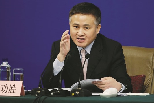 Pan Gongsheng, deputy governor of the Peopleu2019s Bank of China, attends a news conference in Beijing. China will push ahead on oversight and enforce existing regulations on foreign exchange, Pan said yesterday.