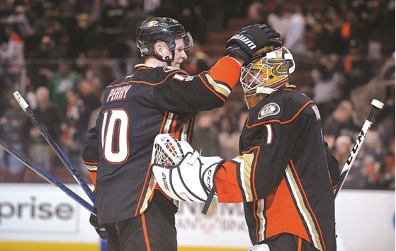 Anaheim Ducks right wing Corey Perry (No 10) celebrates with Anaheim Ducks goalie Jonathan Bernier their victory over Washington Capitals at Honda Centre. PICTURE: USA TODAY Sports