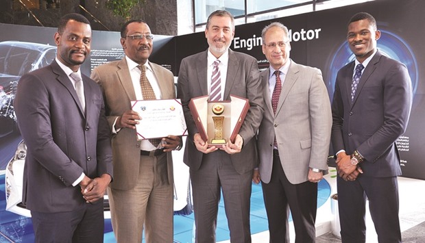 The AAB CEO with other officials.