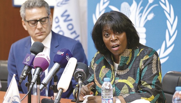 Ertharin Cousin (right), Executive Director of the United Nations World Food Programme, speaks during a news conference discussing the latest challenges the agency is facing in Yemen, in Amman yesterday.