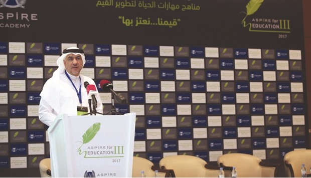 Badr al-Hay speaking at the event.