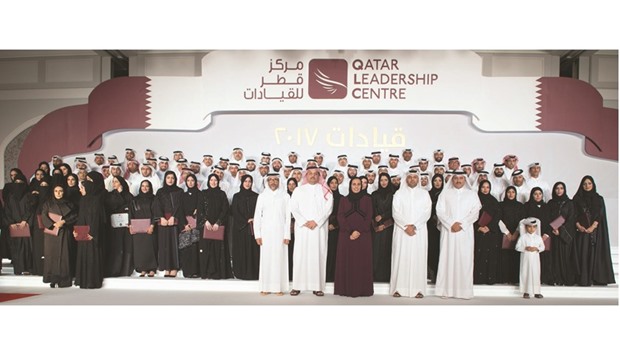 Dignitaries with QLCu2019s 2016-17 National Leadership programme participants at the honouring ceremony in Doha.