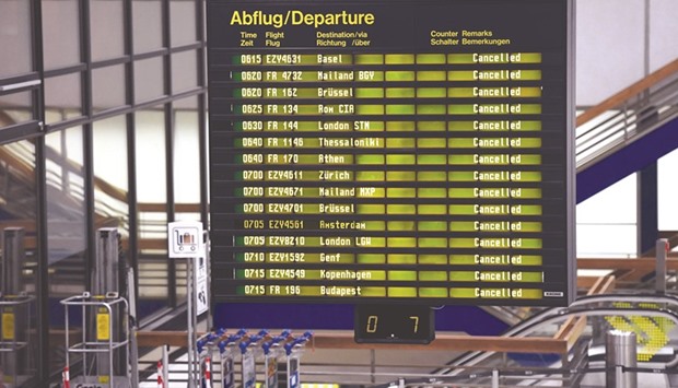 A board at Schoenefeld airport displays cancelled flights yesterday.