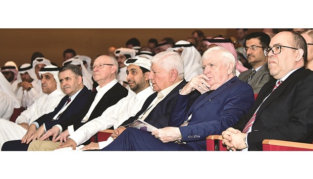 HE Dr al-Ibrahim, Dr al-Derham and other dignitaries at the opening session of the forum at QU yesterday.
