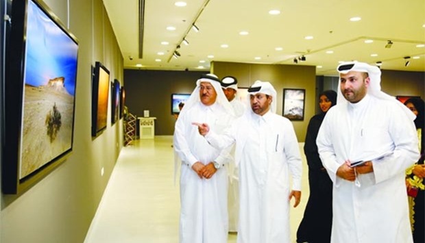 Officials and guests touring the exhibition after the opening.