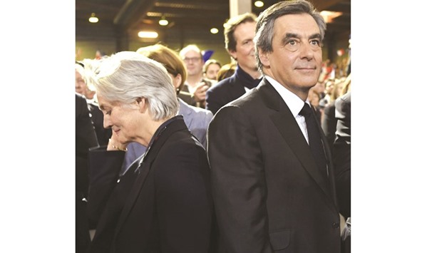Fillon and wife Penelope.