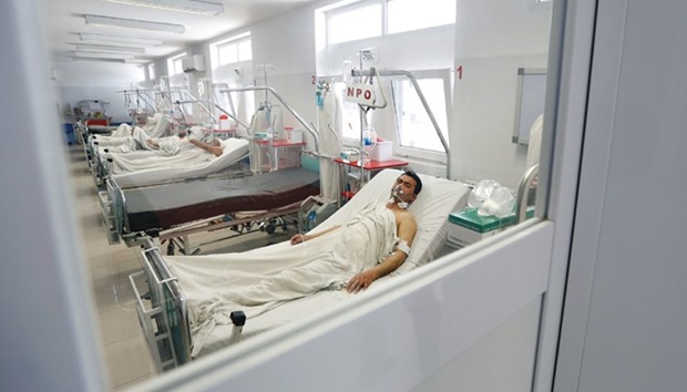 An injured man receives treatment at a hospital a day after a blast in Kabul, Afghanistan, on March 14, 2017.