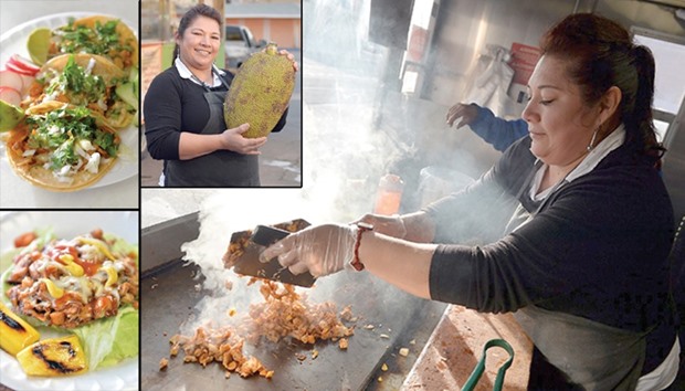 TOP LEFT: Jackfruit tacos.  BELOW LEFT: La Jacka Mobile food truck owner/cook Miriam Martinez creates a jackfruit meat sandwich. Martinez creates many different meatless dishes using the versatile jackfruit including tacos, burritos, quesadillas, milkshakes, smoothies, and fruit water.  INSERT PHOTO: Martinez holds a jackfruit, which can grow up to 100 pounds in size.  MAIN PHOTO: Miriam Martinez cooks chopped, unripe jackfruit on the grill.