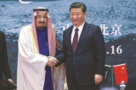 Saudi King Salman bin Abdulaziz al-Saud with Chinau2019s President Xi Jinping in Beijing yesterday. The Saudi king, who has overseen the launch of an ambitious economic reform plan since his accession two years ago, is on a month-long Asian tour.