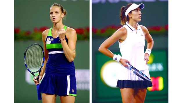 Karolina Pliskova of the Czech Republic celebrates a point against Garbine Muguruza of Spain (R) in their quarter-final match of the BNP Paribas Open at Indian Wells Tennis Garden in Indian Wells, California. (Getty Images/AFP)