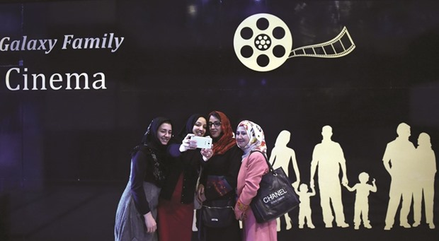 Afghan women take a u2018selfieu2019 after watching a Hollywood movie at the Galaxy Family Cinema in Kabul.