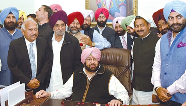 Captain Amarinder Singh takes charge as chief minister of the new Congress government sworn in yesterday in Punjab. Cricketer-turned-politician Navjot Singh Sidhu was inducted as a cabinet minister.