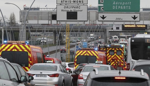 Emergency vehicles arrive Orly airport terminal in Paris