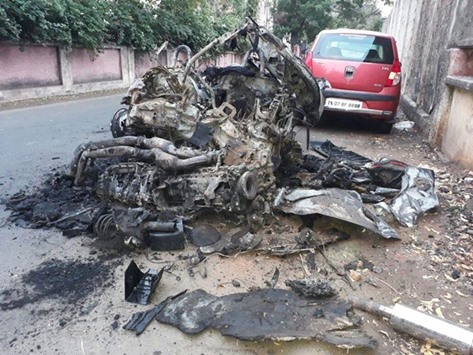 The wreckage of the BMW car. Racing champion Ashwin Sundar and his wife Nivedhitha died after the car crashed into a tree and burst into flames yesterday.
