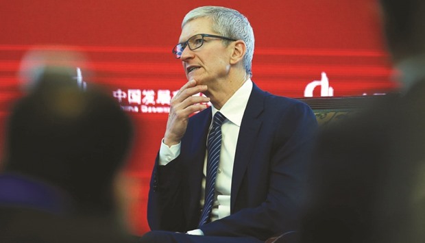 Apple CEO Tim Cook attends the China Development Forum in Beijing yesterday. Cook said globalisation u2018in general is great for the world,u2019 but noted socio-economic gains may not be evenly distributed within or between countries. Despite globalisationu2019s shortcomings, countries should not shy away from such development, he said.