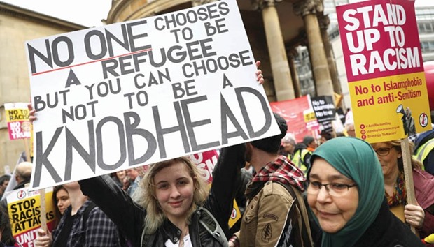 Protesters take part in a demonstration against racism in London yesterday.