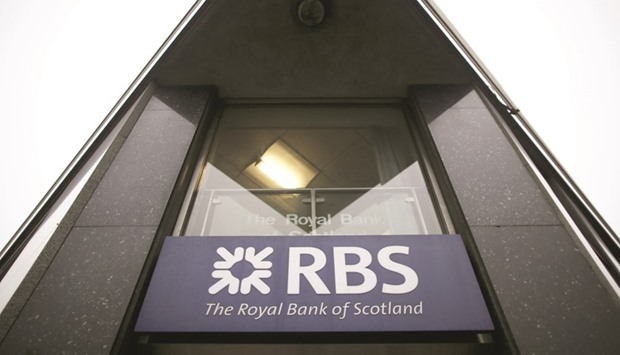A logo is seen on a sign outside a branch of Royal Bank of Scotland Group in London. Lawyers representing tens of thousands of RBS shareholders have held tentative talks to settle a u00a31.2bn  damages claim over the lenderu2019s 2008 rights issue that was launched shortly before a state bailout.